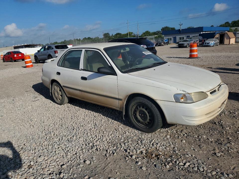 1999 Toyota Corolla VIN 1NXBR12EXXZ288797 COPART salvage auction — MINOR DENT/SCRATCHES, Tx - Certificate Of Title, sold $250 on 2026-07-09 (photo 4)
