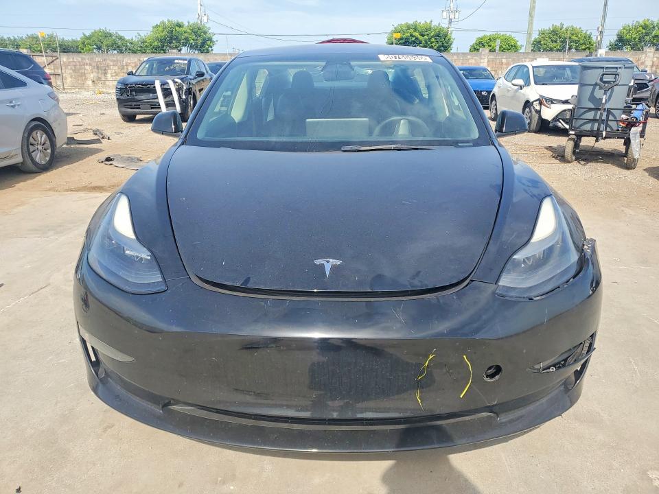 2023 Tesla Model 3 VIN 5YJ3E1EA0PF456887 COPART salvage auction — FRONT END, FL - CERTIFICATE OF TITLE, sold $4,650 on 2026-07-27 (photo 5)