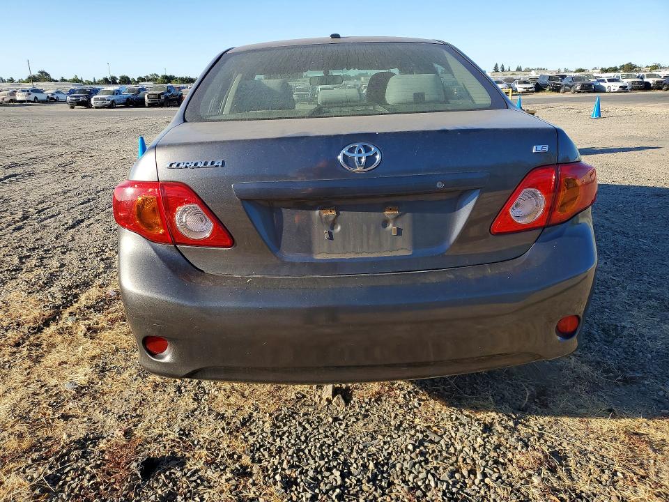 2009 Toyota Corolla VIN JTDBL40E999090485 COPART salvage auction — FRONT END, Ca - Dis/Dlr/Exp Only Clean Title, sold $100 on 2026-07-23 (photo 6)