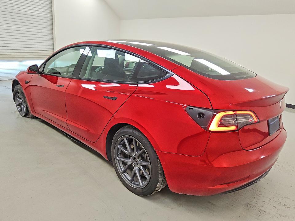 2022 Tesla Model 3 VIN 5YJ3E1EB3NF290872 COPART salvage auction — ALL OVER, TX - CERTIFICATE OF TITLE, sold $3,350 on 2026-07-20 (photo 2)