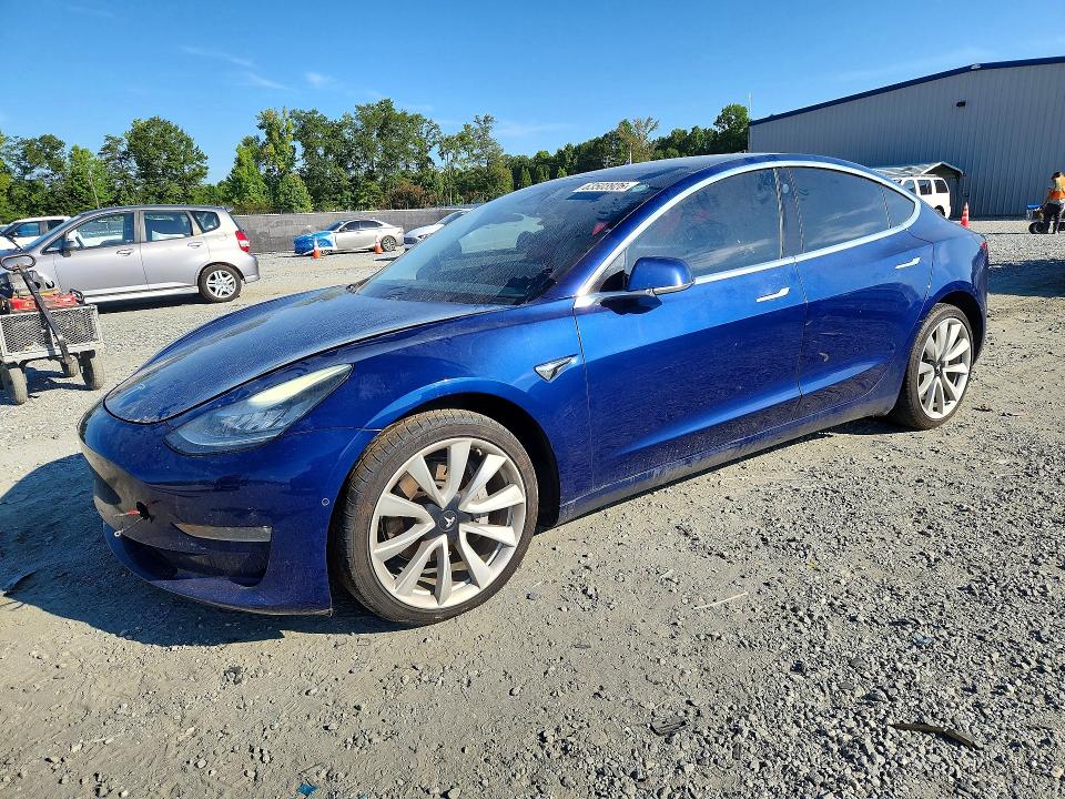2018 Tesla Model 3 VIN 5YJ3E1EB1JF133867 COPART salvage auction — MINOR DENT/SCRATCHES, Nc - Dealer Only Clean Title (P), sold $7,300 on 2026-08-19 (photo 1)
