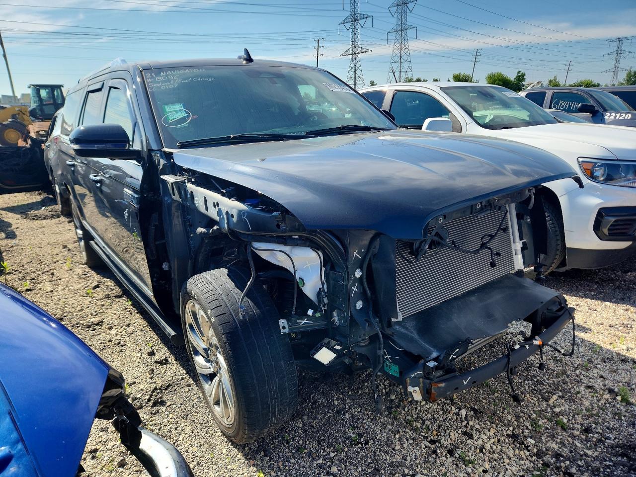 2024 Lincoln Navigator VIN 5LMJJ3NG6REL12471 COPART salvage auction — Front End, IL - SALVAGE CERTIFICATE, sold $24,800 on 2026-07-10 (photo 4)