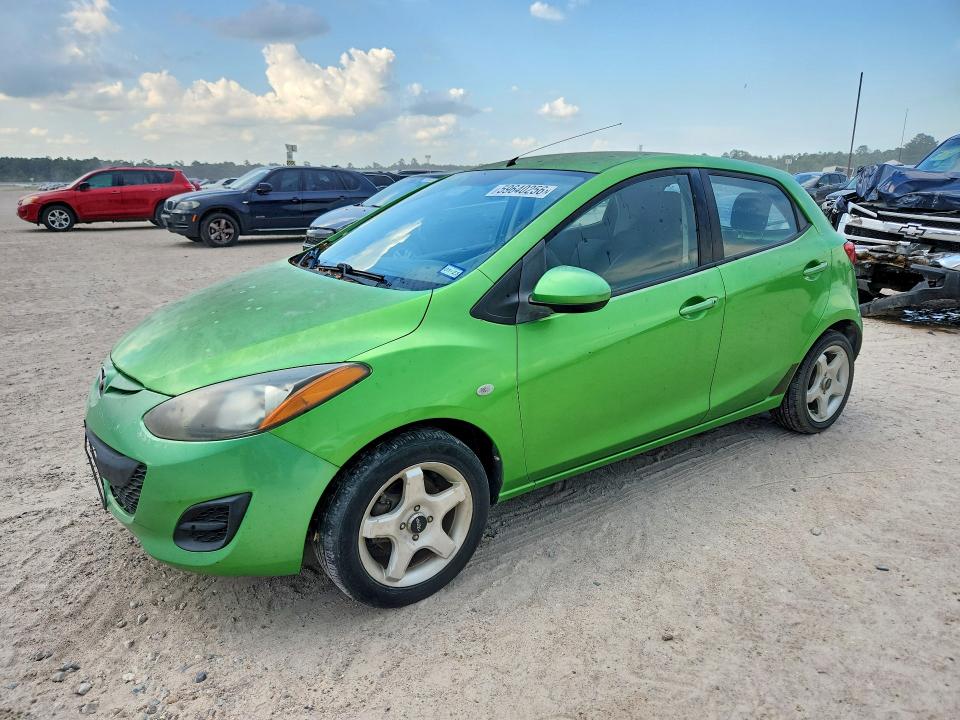 2011 Mazda 2 VIN JM1DE1HY8B0110252 COPART salvage auction — MINOR DENT/SCRATCHES, TX - CERTIFICATE OF TITLE, sold $850 on 2026-07-10 (photo 1)