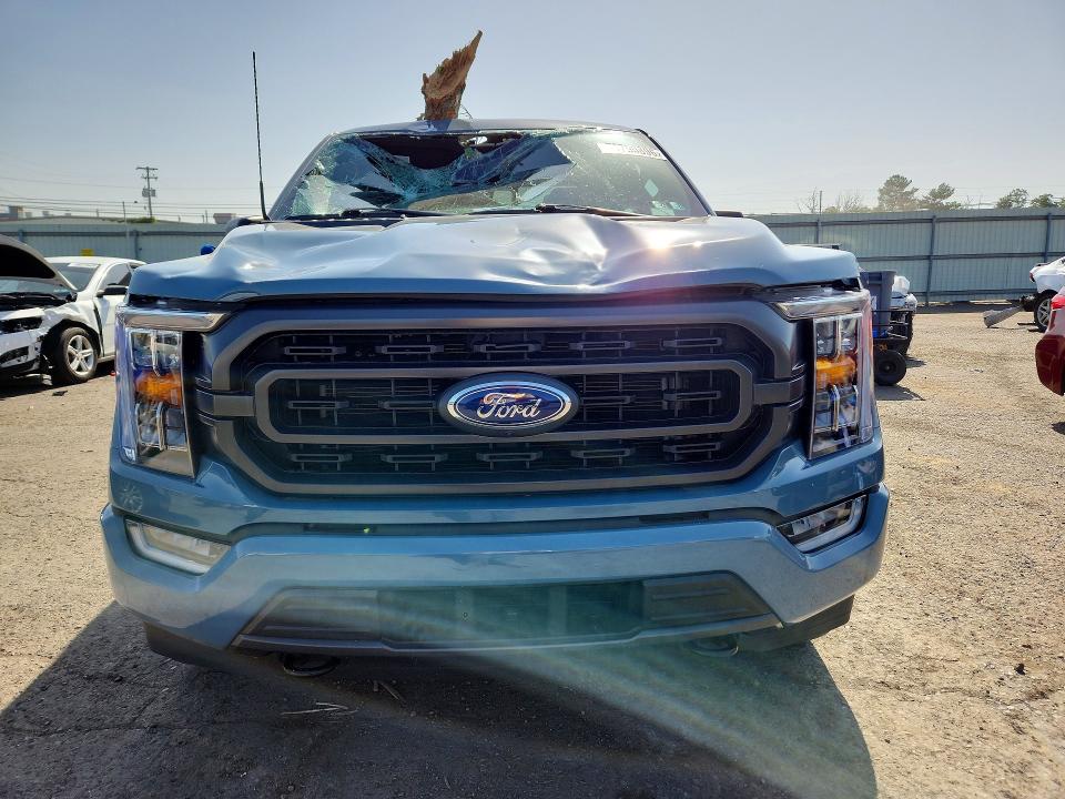 2023 Ford F-150 lightning VIN 1FTFW1E83PKE23053 COPART salvage auction — ROOF, PA - CERTIFICATE OF SALVAGE, sold $9,200 on 2026-07-28 (photo 5)