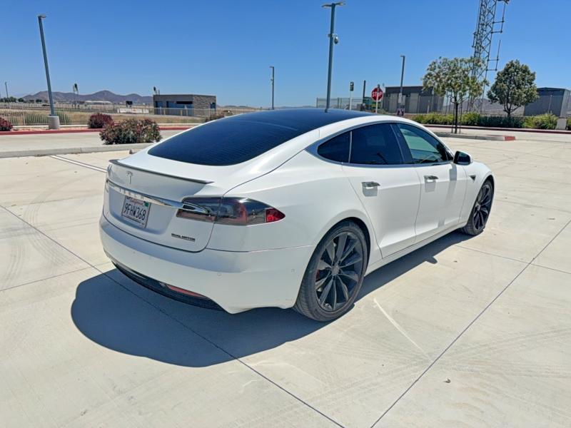 2021 Tesla Model s VIN 5YJSA1E47MF427870 COPART salvage auction — NORMAL WEAR, Ca - Dlr/Dis/Exp Only Salvage Title (P), sold $12,800 on 2026-07-30 (photo 4)