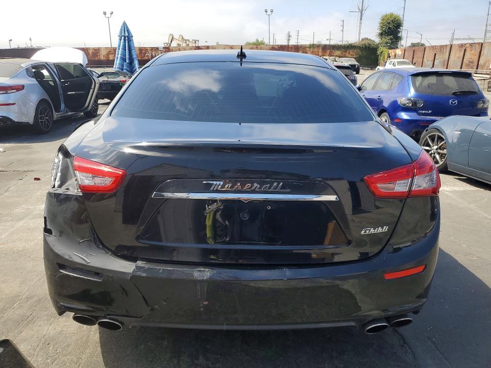 2016 Maserati Ghibli VIN ZAM57RSA7G1187524 COPART salvage auction — REAR END, TX - DIS/DLR/EXP ONLY SALVAGE TITLE, sold $1,100 on 2026-07-29 (photo 6)