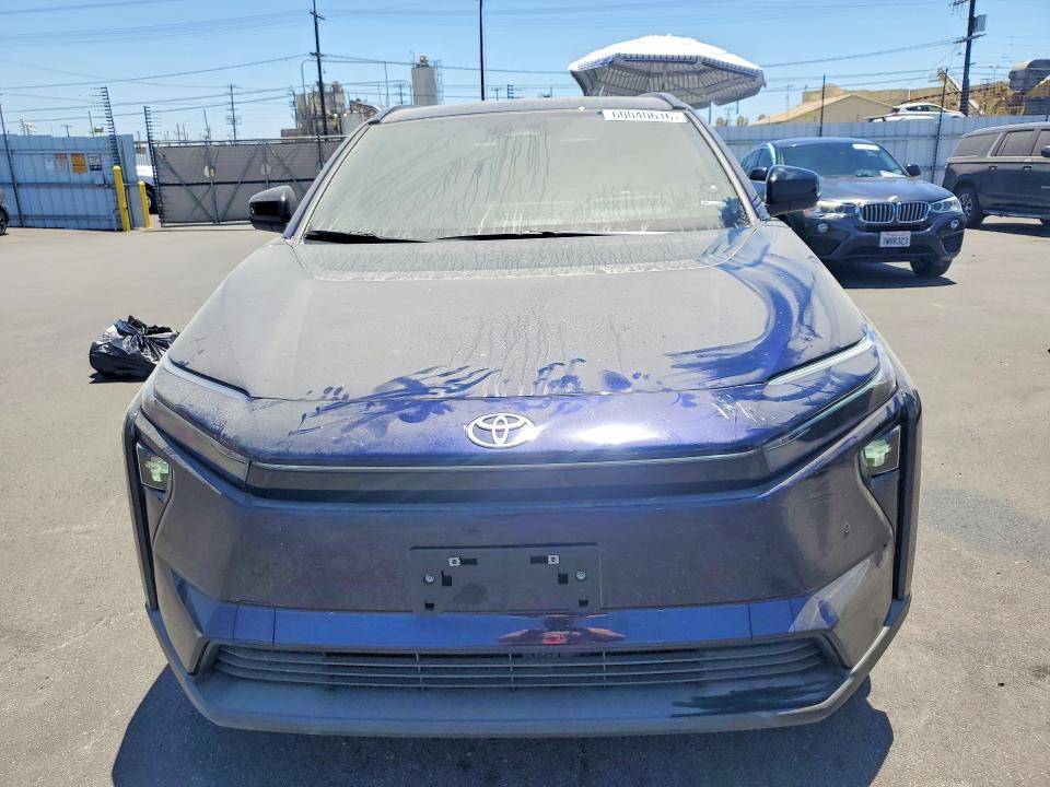 2026 Toyota Bz4x VIN JTMBCAEB3TA007068 COPART salvage auction — REAR END, CA - SALVAGE CERTIFICATE, sold $9,300 on 2026-08-26 (photo 5)