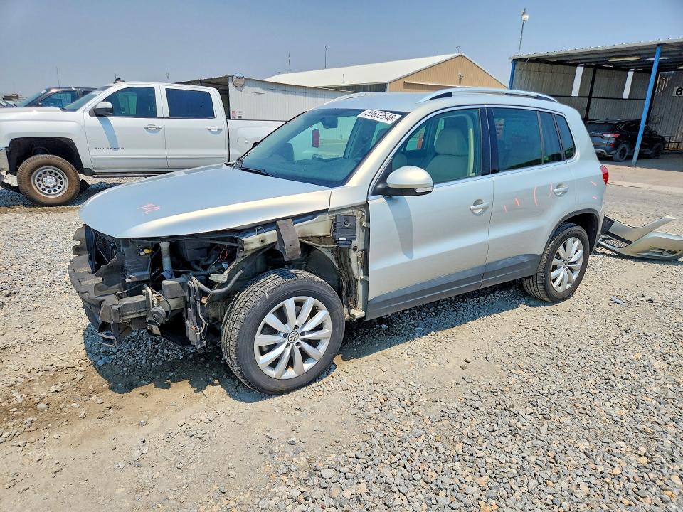 2011 Volkswagen Tiguan VIN WVGAV7AX4BW555975 COPART salvage auction — FRONT END, CO - PUBLIC - SALVAGE TITLE (P), sold $1,000 on 2026-07-09 (photo 1)