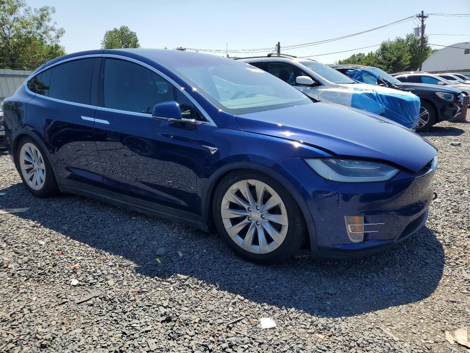 2017 Tesla Model x VIN 5YJXCBE24HF054703 COPART salvage auction — MINOR DENT/SCRATCHES, Tx - Certificate Of Title (P), sold $20,000 on 2026-07-24 (photo 4)