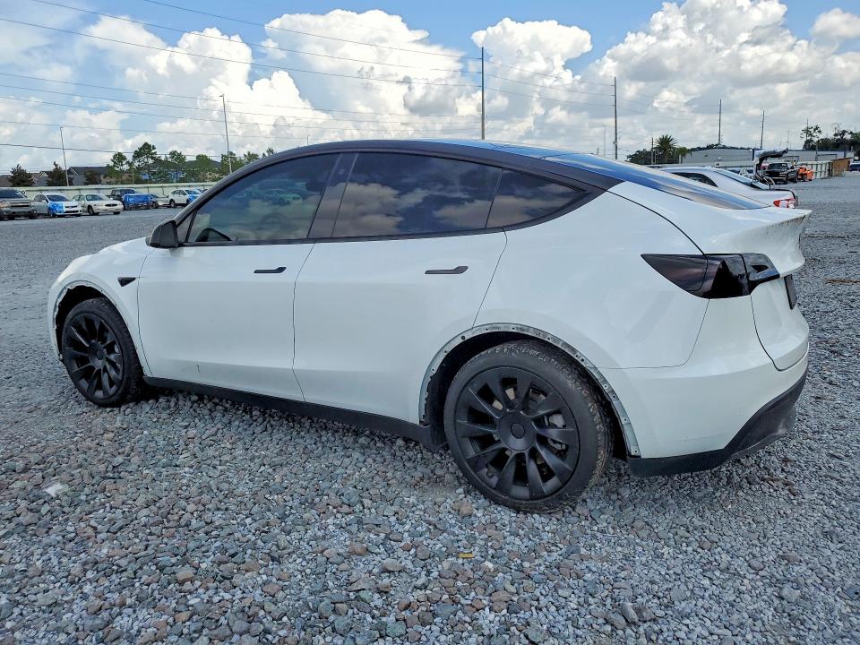 2023 Tesla Model y VIN 7SAYGDEE4PF608631 COPART salvage auction — SIDE, FL - CERT OF TITLE SLVG REBUILDABLE, sold $10,700 on 2026-07-31 (photo 2)