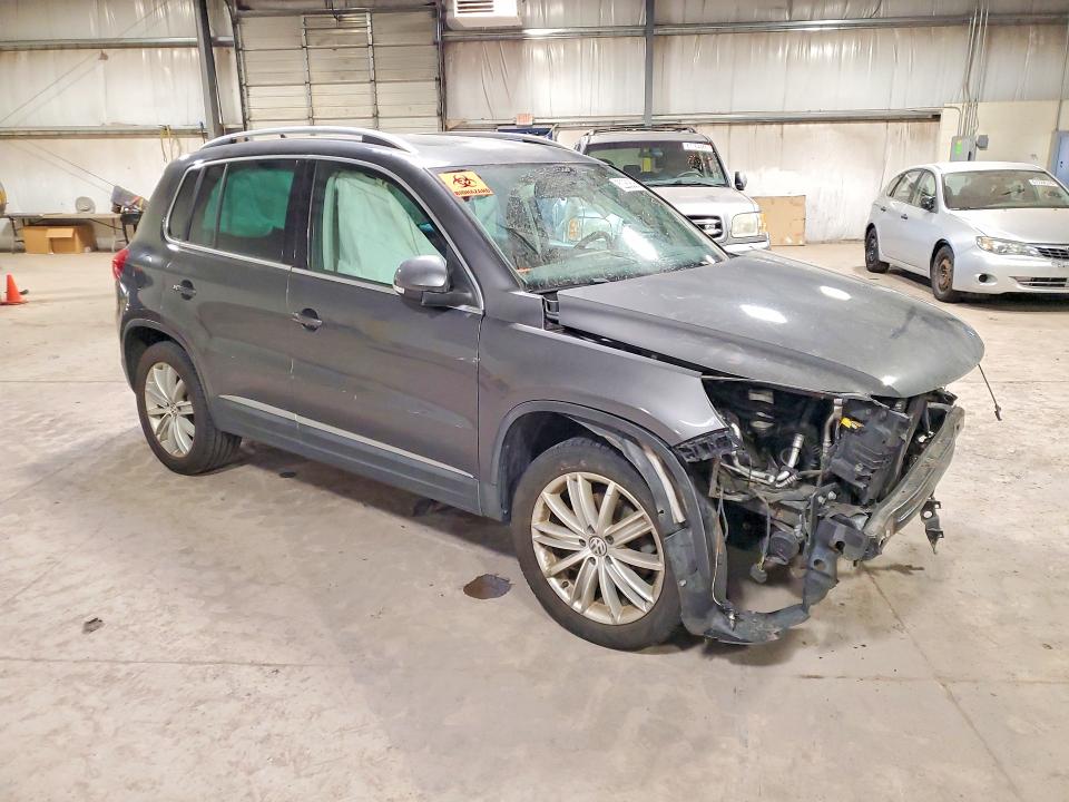 2013 Volkswagen Tiguan VIN WVGAV3AX7DW592613 COPART salvage auction — FRONT END, Salvage Title, sold $15 on 2026-08-10 (photo 4)