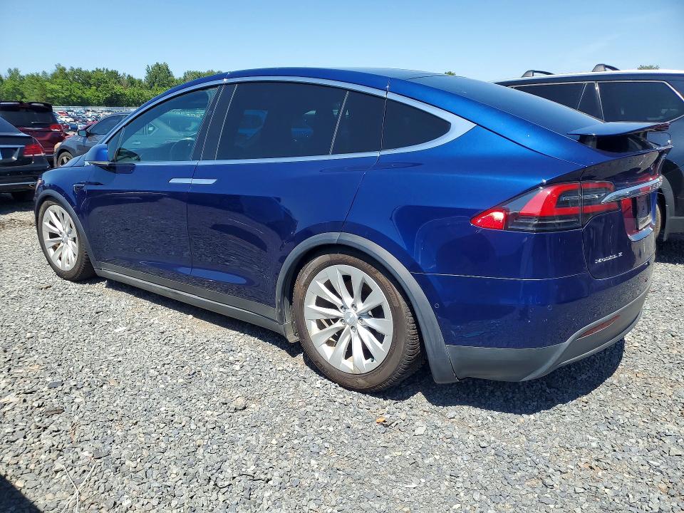 2017 Tesla Model x VIN 5YJXCBE24HF054703 COPART salvage auction — MINOR DENT/SCRATCHES, Tx - Certificate Of Title, sold $7,300 on 2026-07-31 (photo 2)