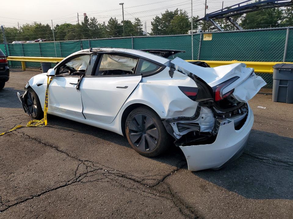 2025 Tesla Model 3 VIN 5YJ3E1EA1SF990327 COPART salvage auction — ALL OVER, Co - Certificate Of Title, sold $0 on 2026-09-16 (photo 2)