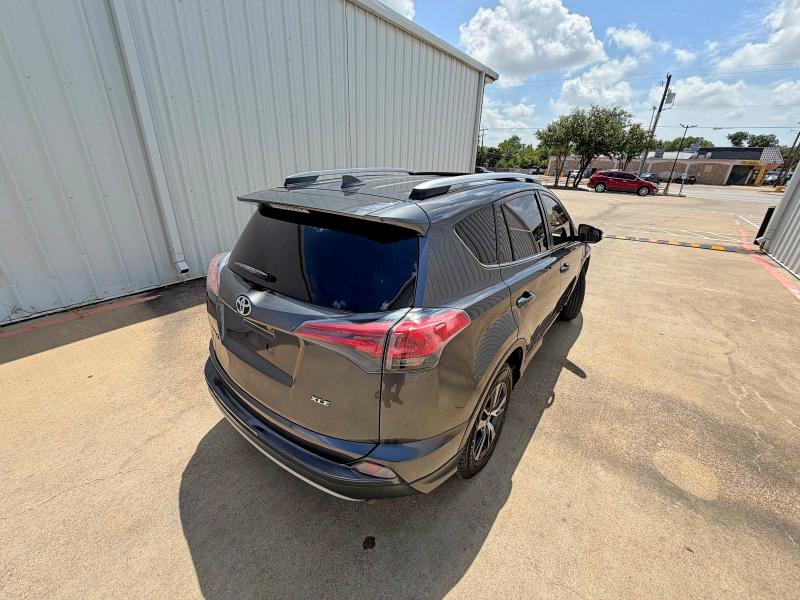 2017 Toyota Rav4 VIN JTMWFREV8HJ711890 COPART salvage auction — MINOR DENT/SCRATCHES, TX - CERTIFICATE OF TITLE (P), sold $29,500 on 2026-07-25 (photo 4)