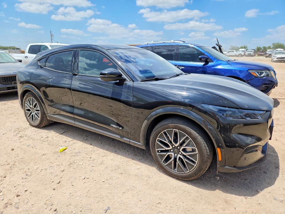2026 Ford Mustang mach-e VIN 3FMTK3R75TMA01974 COPART salvage auction — SIDE, Tx - Salvage Vehicle Title, sold $11,100 on 2026-08-20 (photo 4)