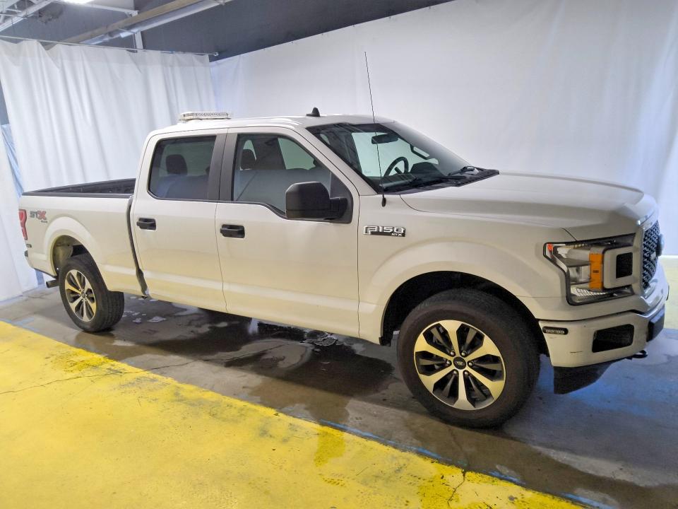 2020 Ford F-150 lightning VIN 1FTFW1E56LFB35469 COPART salvage auction — MINOR DENT/SCRATCHES, In - Certificate Of Title, sold $8,700 on 2026-07-28 (photo 4)