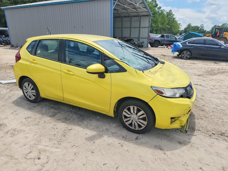 2016 Honda Fit VIN JHMGK5H51GX013541 COPART salvage auction — ROOF, Fl - Cert Of Title Slvg Rebuildable, sold $1,700 on 2026-07-31 (photo 4)