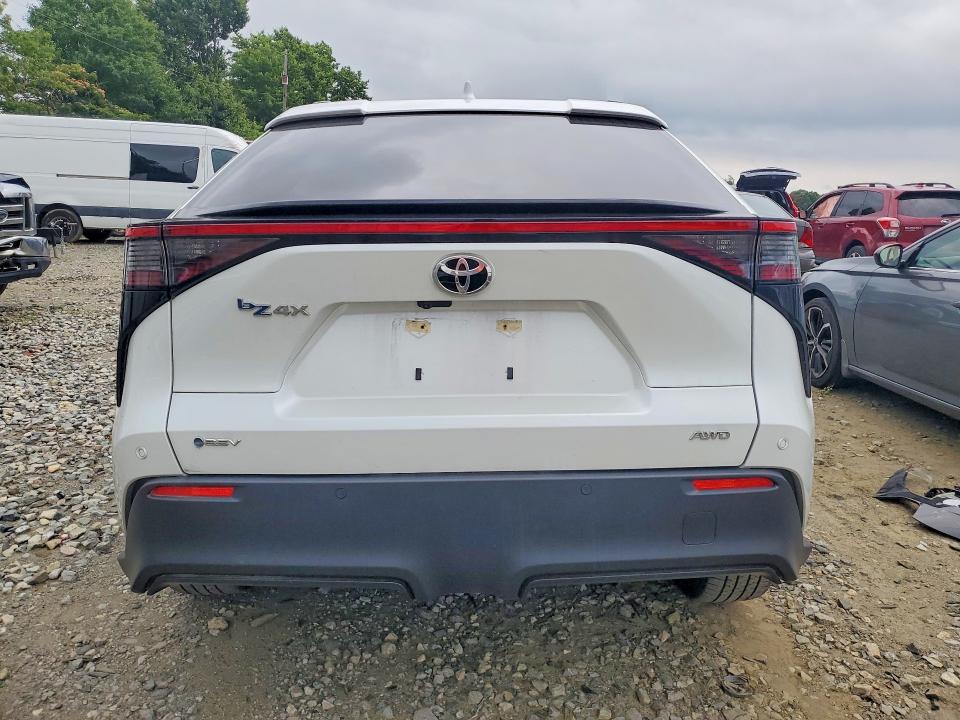 2024 Toyota Bz4x VIN JTMABACA2RA085472 COPART salvage auction — FRONT END, Salvage Title, sold $8,800 on 2026-08-24 (photo 6)