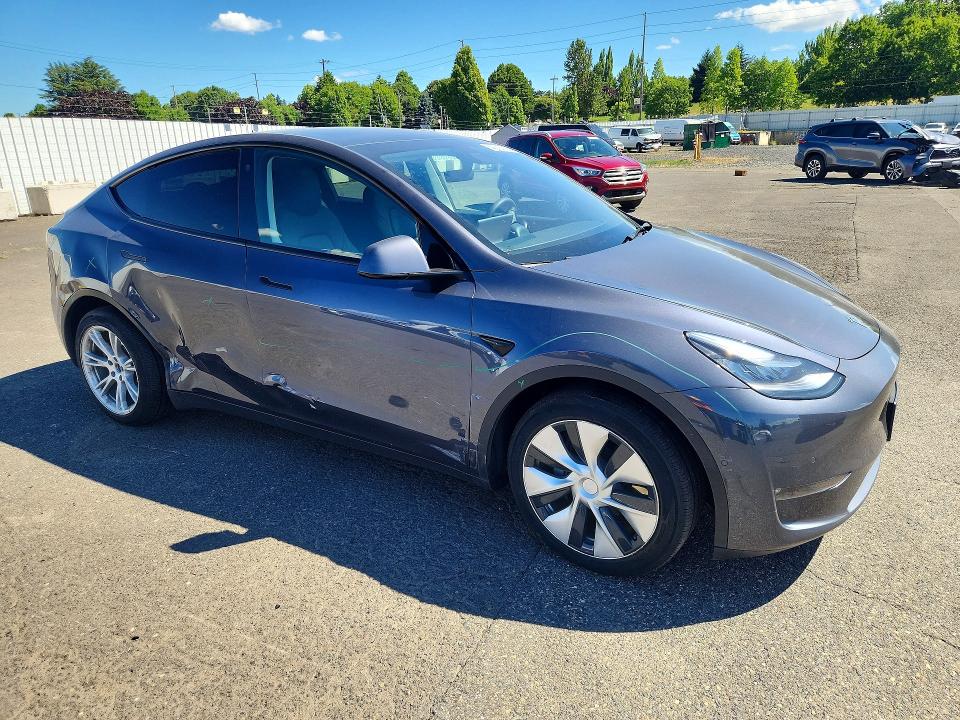 2021 Tesla Model y VIN 5YJYGDEE3MF229998 COPART salvage auction — SIDE, OR - SALVAGE TITLE CERTIFICATE, sold $125 on 2026-09-07 (photo 4)