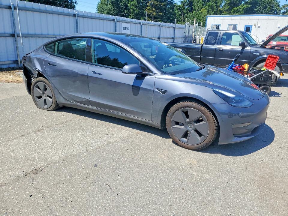 2023 Tesla Model 3 VIN 5YJ3E1EA8PF690582 COPART salvage auction — REAR END, Wa - Bill Of Sale, sold $8,700 on 2026-07-20 (photo 4)