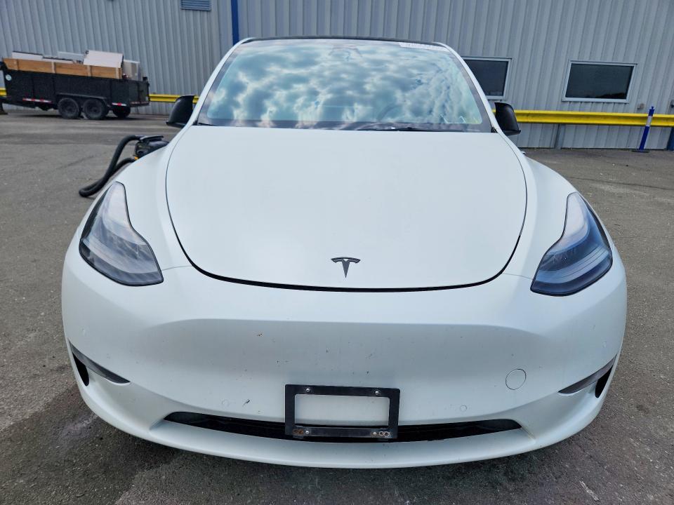 2022 Tesla Model y VIN 7SAYGDEF6NF308174 COPART salvage auction — MINOR DENT/SCRATCHES, Ny - Certificate Of Title (P), sold $12,700 on 2026-07-28 (photo 5)