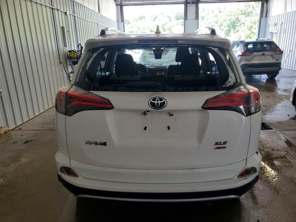 2017 Toyota Rav 4 VIN JTMRFREV5HJ144728 COPART salvage auction — ROLLOVER, Pa - Certificate Of Salvage, sold $525 on 2026-07-29 (photo 6)