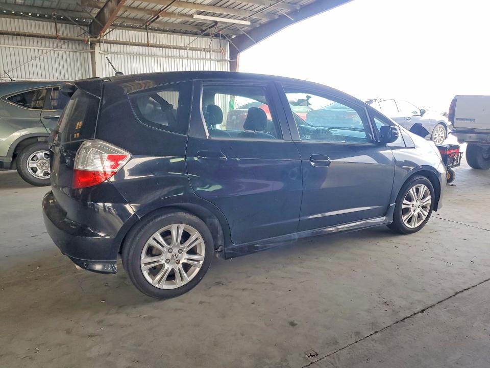 2009 Honda Fit VIN JHMGE88419S018741 COPART salvage auction — MINOR DENT/SCRATCHES, Ca - Dis/Dlr/Exp Only Clean Title, sold $825 on 2026-07-30 (photo 3)