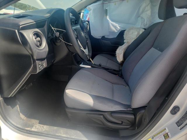 2017 Toyota Corolla VIN 5YFBURHE3HP671827 COPART salvage auction — SIDE, Fl - Cert Of Title Slvg Rebuildable, sold $375 on 2026-07-28 (photo 7)