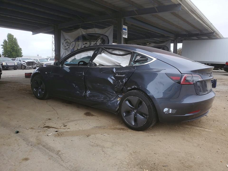 2018 Tesla VIN 5YJ3E1EB4JF129005 COPART salvage auction — SIDE, Ca - Salvage Certificate, sold $4,550 on 2026-07-19 (photo 2)