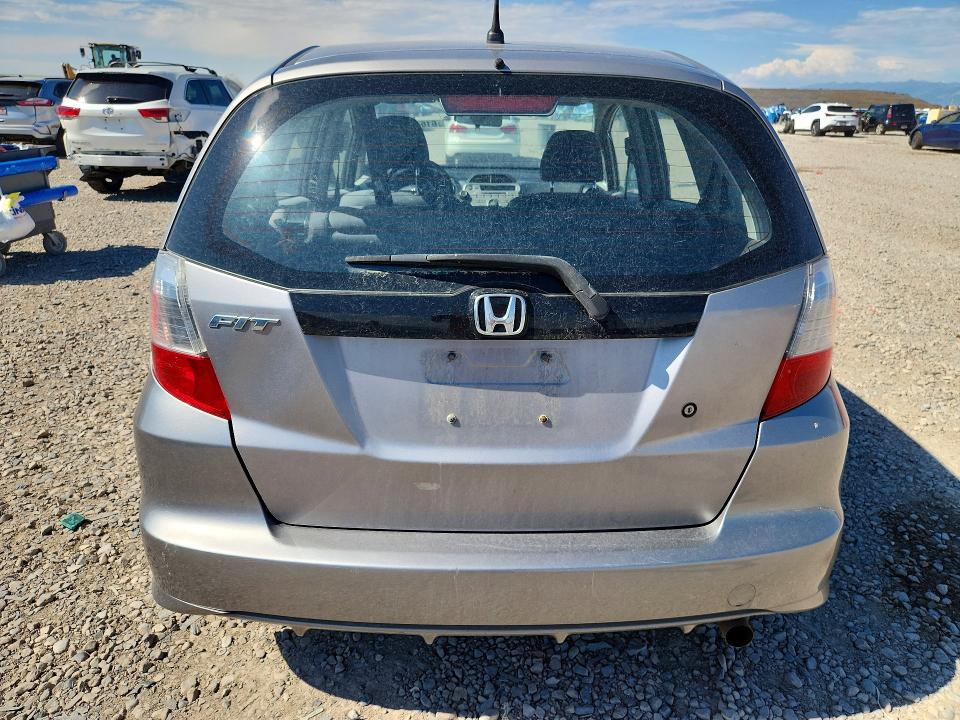 2009 Honda Fit VIN JHMGE88239S070080 COPART salvage auction — MECHANICAL, Ut - Certificate Of Title, sold $650 on 2026-07-31 (photo 6)