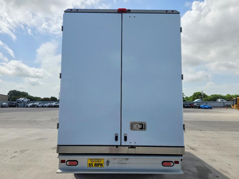 2023 Ford Econoline VIN 1FDWE3FK1PDD26510 COPART salvage auction — NORMAL WEAR, TX - CERTIFICATE OF TITLE, sold $11,500 on 2026-07-27 (photo 6)