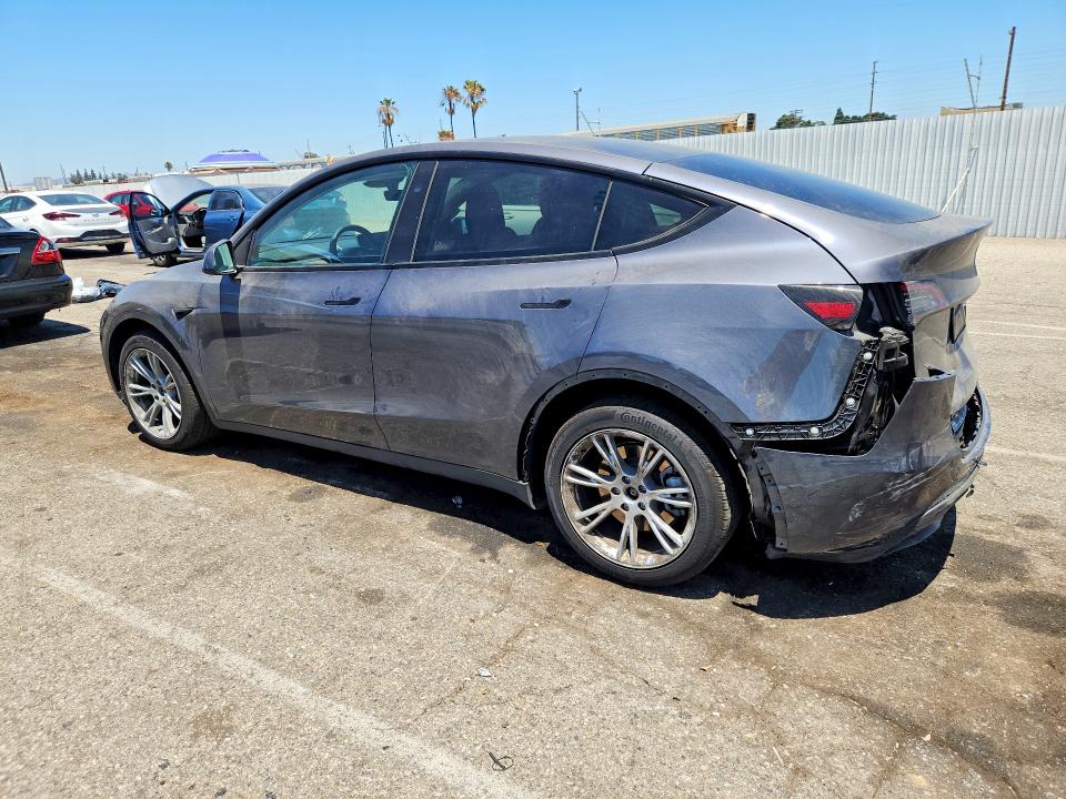 2023 Tesla Model y VIN 7SAYGDEE8PF918877 COPART salvage auction — REAR END, CA - SALVAGE CERTIFICATE, sold $15,700 on 2026-07-24 (photo 2)