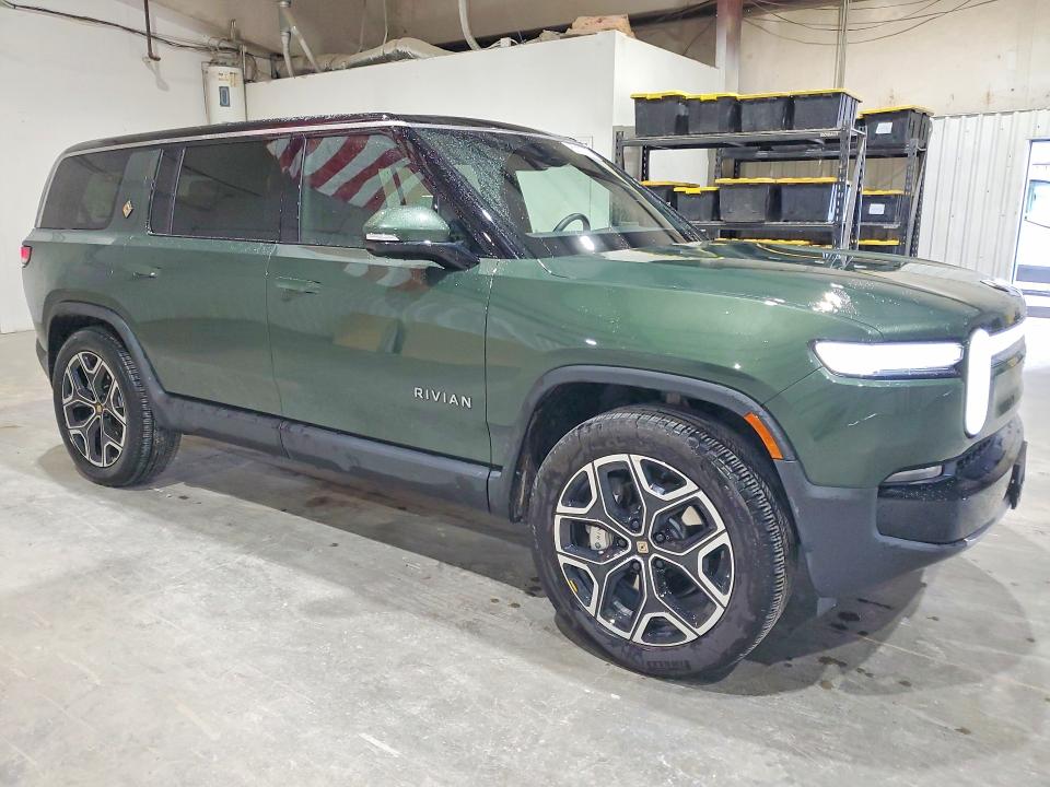2025 Rivian R1s VIN 7PDSGBBA6SN057582 COPART salvage auction — MINOR DENT/SCRATCHES, Ok - Cert Of Title-Rebuilt, sold $33,250 on 2026-07-08 (photo 4)