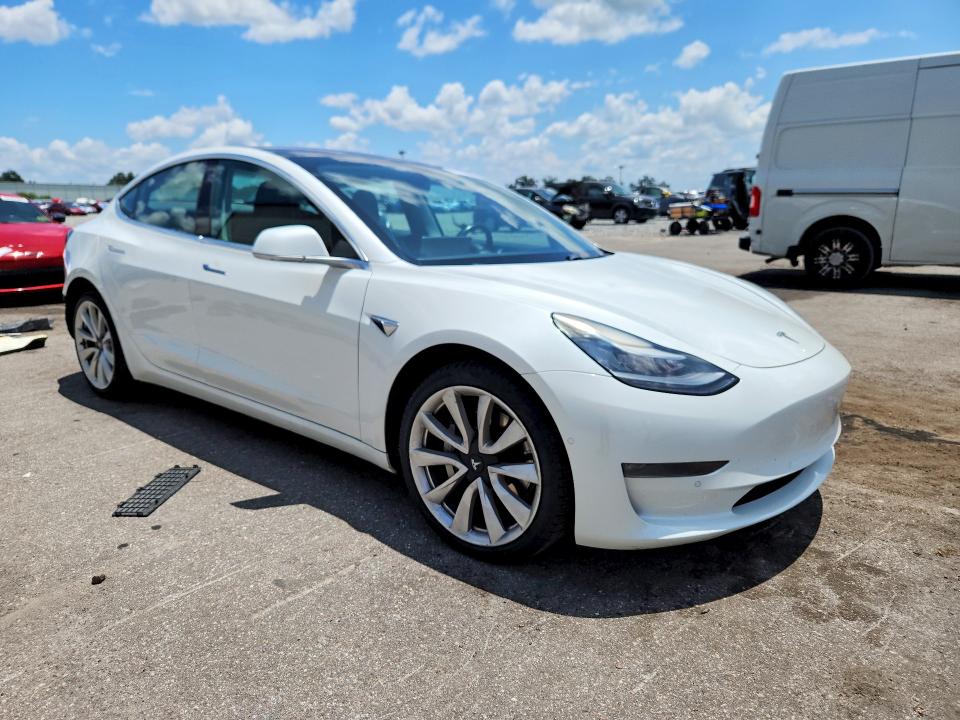 2018 Tesla Model 3 VIN 5YJ3E1EA9JF154604 COPART salvage auction — REAR END, FL - CERT OF TITLE SLVG REBUILDABLE, sold $5,800 on 2026-09-18 (photo 4)