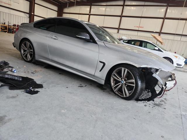 2014 BMW 4er VIN WBA3R1C57EK192056 COPART salvage auction — FRONT END, Fl - Cert Of Title Slvg Rebuildable, sold $550 on 2026-08-21 (photo 4)