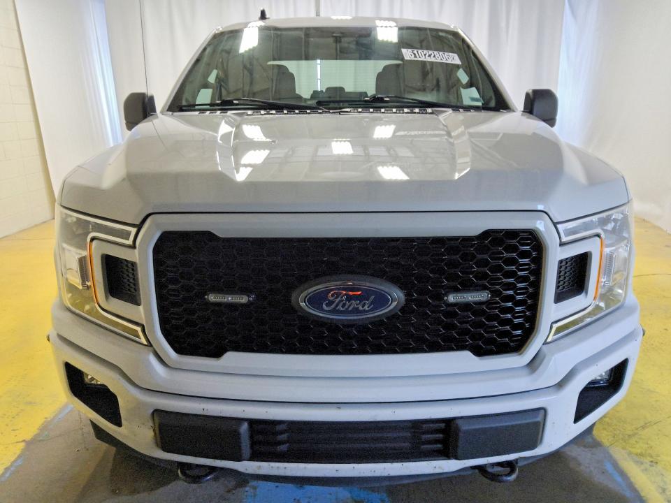 2020 Ford F-150 lightning VIN 1FTFW1E56LFB35469 COPART salvage auction — MINOR DENT/SCRATCHES, In - Certificate Of Title, sold $8,700 on 2026-07-28 (photo 5)