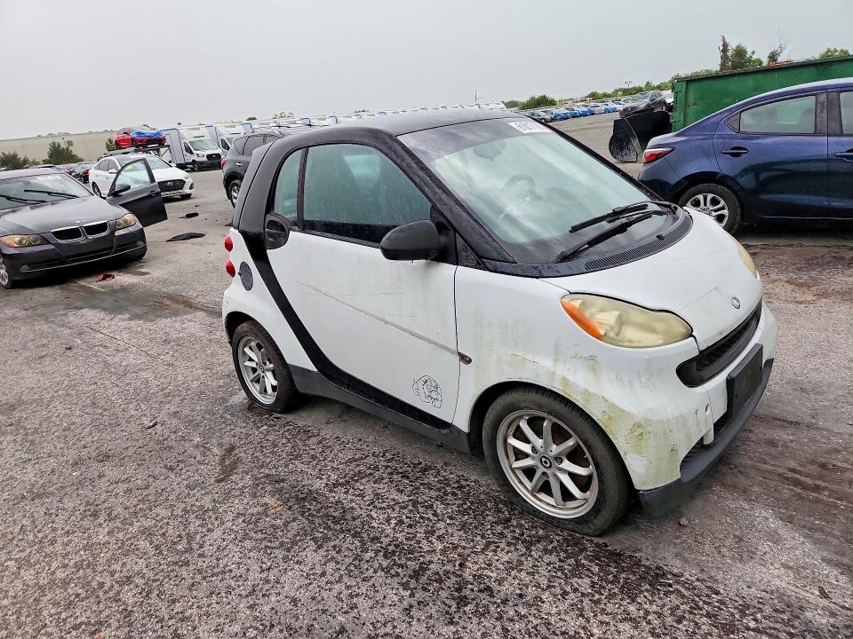 2009 Smart Fortwo VIN WMEEJ31X39K210210 COPART salvage auction — MINOR DENT/SCRATCHES, FL - CERTIFICATE OF TITLE (P), sold $900 on 2026-07-23 (photo 4)