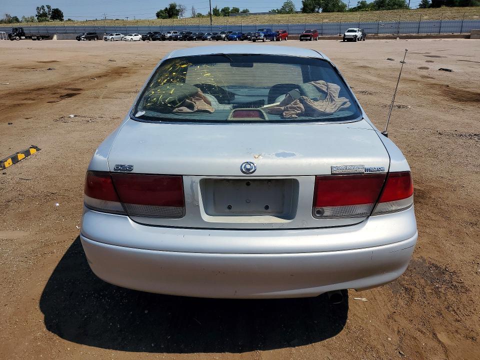 1993 Mazda 626 VIN 1YVGE22A8P5238140 COPART salvage auction — MINOR DENT/SCRATCHES, Co - Dis/Dlr/Exp Only Clean Title, sold $250 on 2026-07-22 (photo 6)