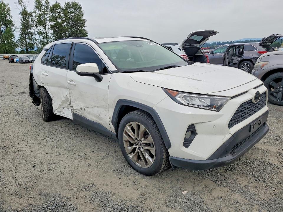 2019 Toyota Rav 4 VIN JTMA1RFV6KD011086 COPART salvage auction — SIDE, WA - BILL OF SALE, sold $8,700 on 2026-07-27 (photo 4)