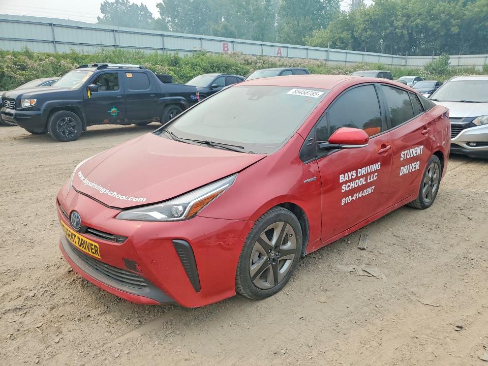 2021 Toyota Prius VIN JTDKAMFU5M3131727 — COPART salvage auction photo
