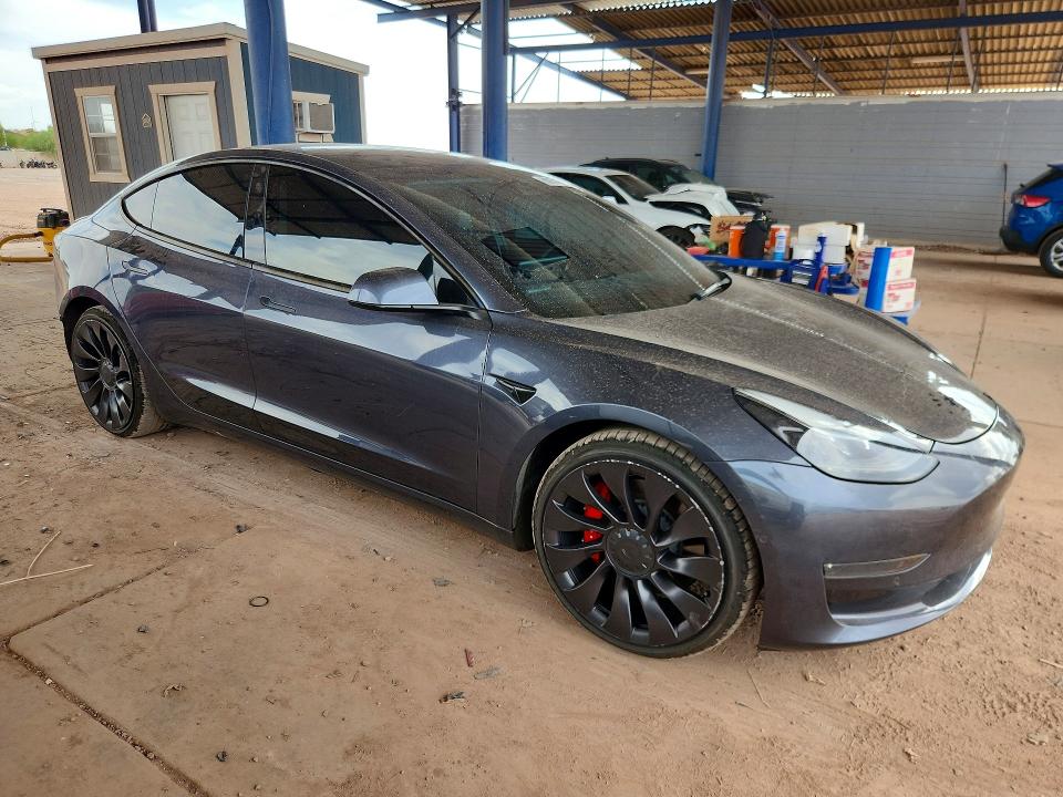 2022 Tesla Model 3 VIN 5YJ3E1EC3NF177285 COPART salvage auction — SIDE, Salvage Title, sold $1,100 on 2026-07-21 (photo 4)