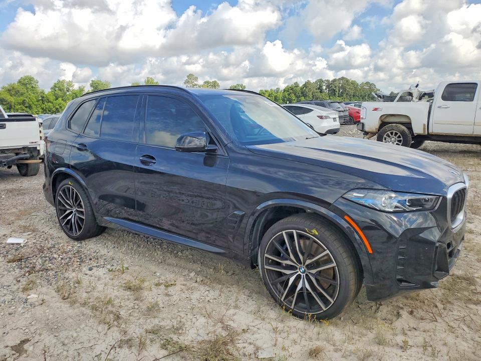 2025 BMW X5 VIN 5UX33EU01S9Y53810 COPART salvage auction — WATER/FLOOD, TX - SALVAGE TITLE-FLOOD DAMAGE, sold $35,750 on 2026-09-11 (photo 4)