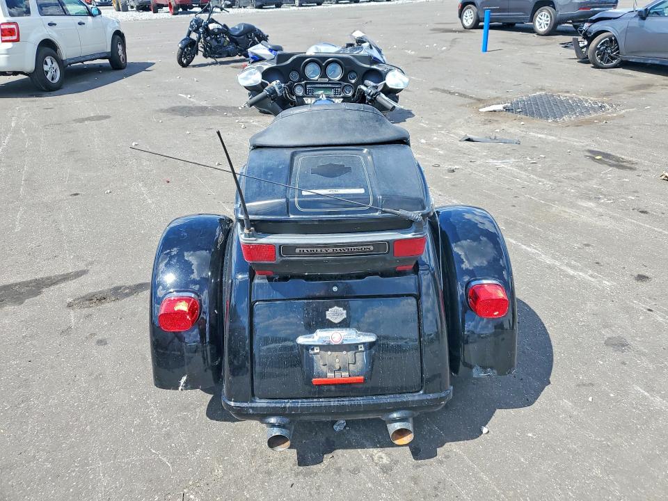 2009 Harley-davidson Flhtcutg VIN 1HD1MAM149Y853547 COPART salvage auction — FRONT END, FL - CERT OF TITLE SLVG REBUILDABLE, sold $3,400 on 2026-07-22 (photo 4)