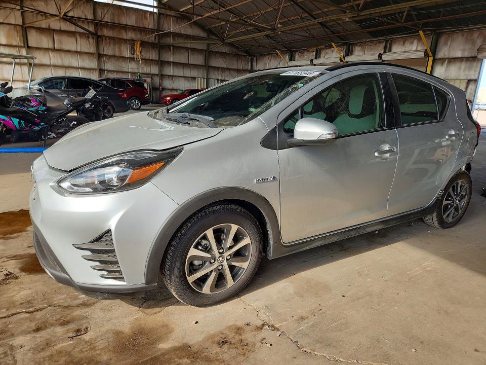 2018 Toyota Prius c VIN JTDKDTB34J1614566 COPART salvage auction — REAR END, AZ - CERT OF TITLE - SALVAGE, sold $2,650 on 2026-07-27 (photo 1)