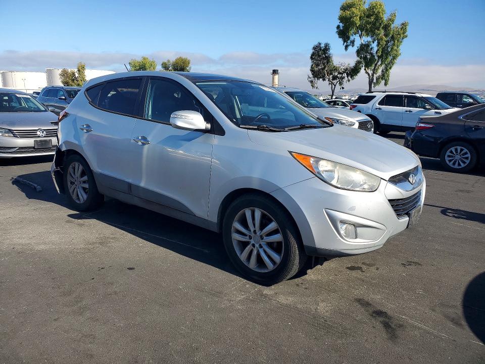 2011 Hyundai Tucson VIN KM8JU3AC4BU140255 COPART salvage auction — REAR END, CA - SALVAGE CERTIFICATE, sold $1,100 on 2026-07-15 (photo 4)