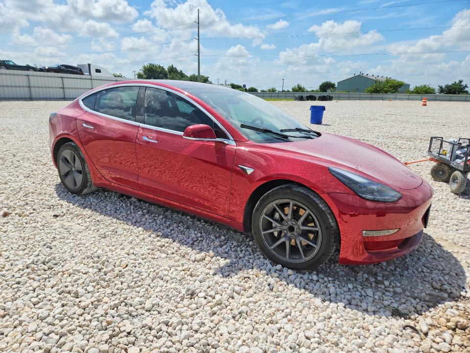 2018 Tesla VIN 5YJ3E1EA6JF059790 COPART salvage auction — SIDE, TX - SALVAGE VEHICLE TITLE (P), sold $6,600 on 2026-07-30 (photo 4)
