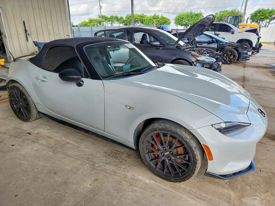 2016 Mazda VIN JM1NDAC76G0106603 COPART salvage auction — SIDE, Fl - Cert Of Title Slvg Rebuildable, sold $2,300 on 2026-07-15 (photo 4)