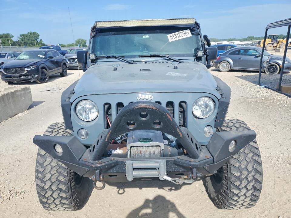 2014 Jeep Wrangler / VIN 1C4BJWDG5EL312868 COPART salvage auction — SIDE, Ks - Cert Of Title-Salvage, sold $3,100 on 2026-07-28 (photo 5)