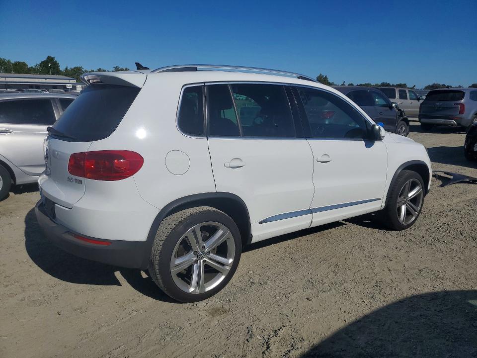 2014 Volkswagen Tiguan VIN WVGAV3AXXEW103879 COPART salvage auction — MECHANICAL, Ca - Dis/Dlr/Exp Only Clean Title, sold $15 on 2026-08-05 (photo 3)