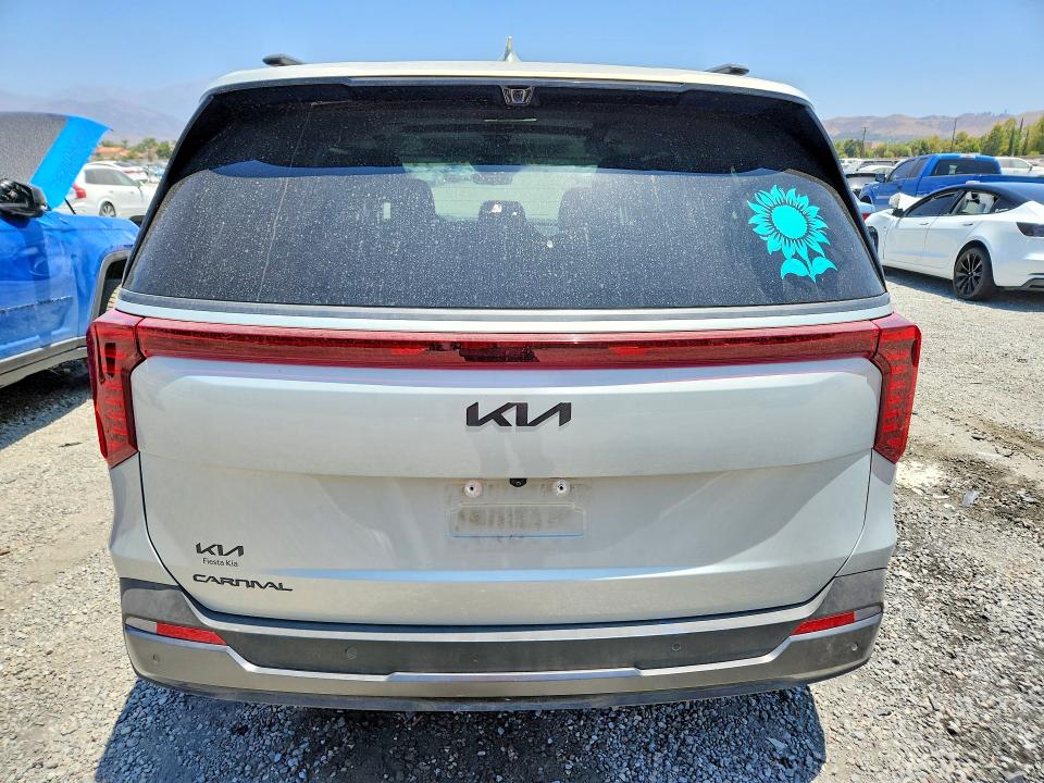 2025 Kia Carnival VIN KNDNE5K31S6507775 COPART salvage auction — SIDE, Ca - Salvage Certificate, sold $4,100 on 2026-07-29 (photo 6)